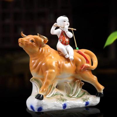 TƯỢNG SỨ TIỂU ĐỒNG CƯỠI TRÂU THỔI SÁO